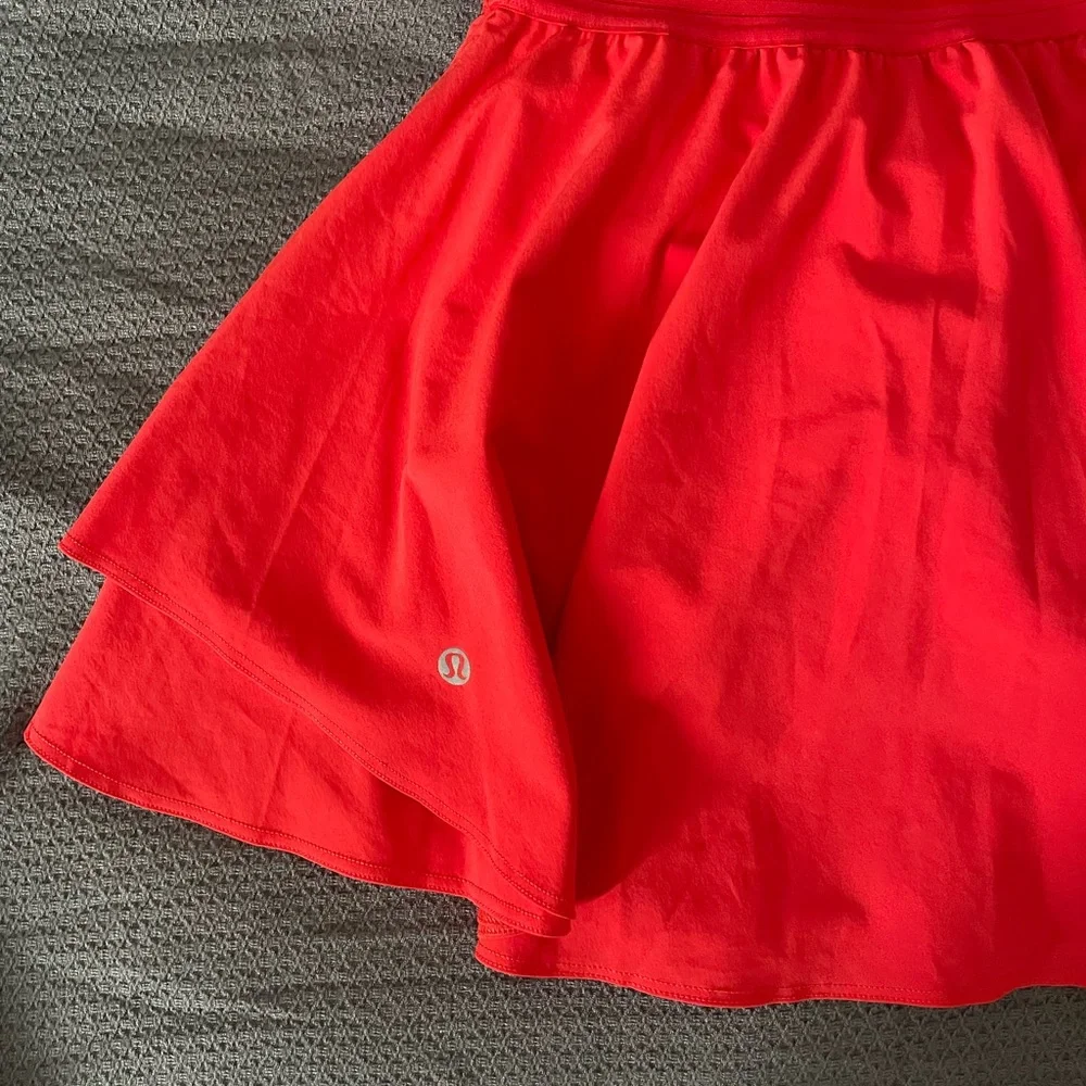 Lululemon Court Rival 14” Skirt in a vibrant Coral color - Picture 6 of 12